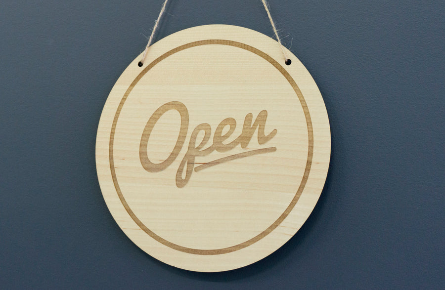 Open sign for cafe on blue background